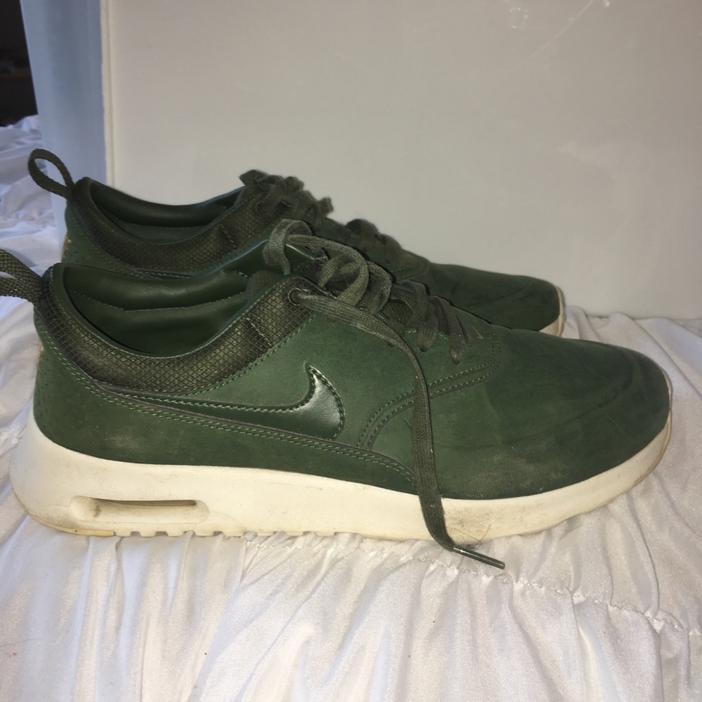 Dark green leather Nike Airs